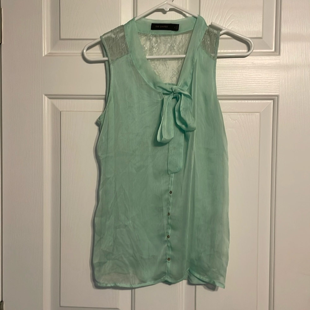 Vintage inspired sleeveless bow tie blouse.